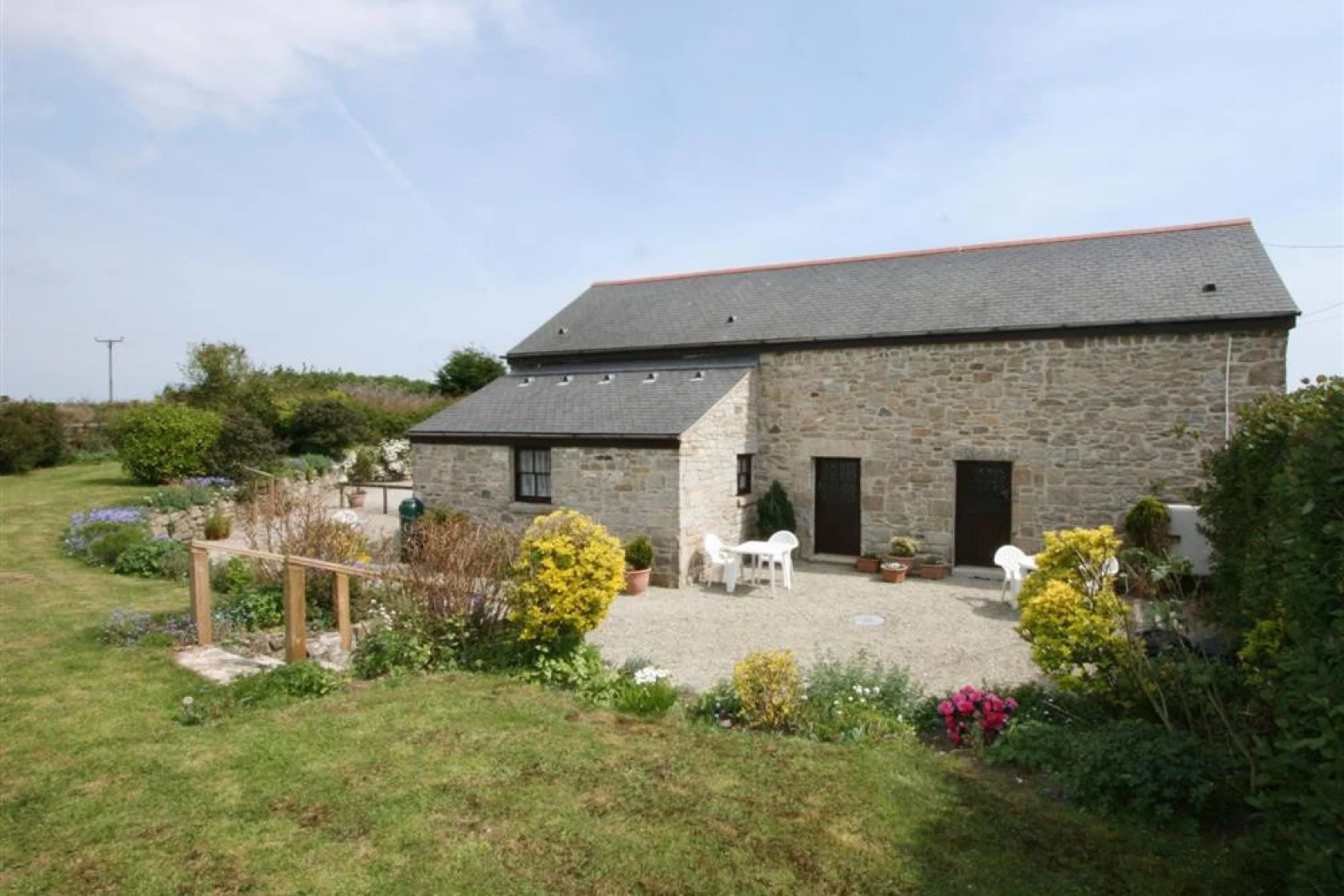 Rear view of property and garden