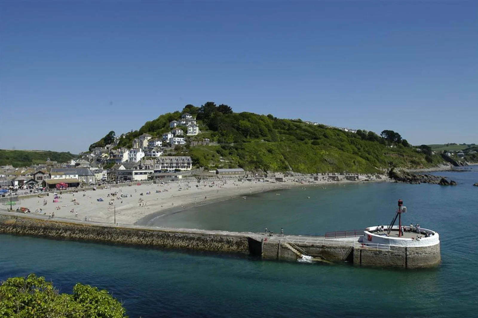 The Looe Banjo Pier and sandy beach, only yards away from Jemima Cottage