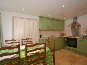 Another view of the kitchen and dining area