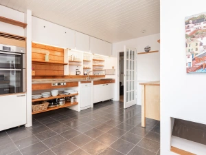 The retro kitchen with picture windows to watch the sea whilst you cook!