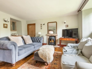 Drawing room with wood burner & smart TV