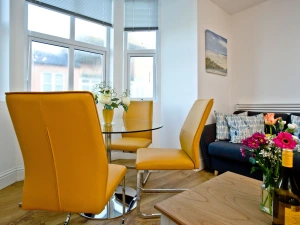 Dining table and chairs with sea view - 5 At The Beach