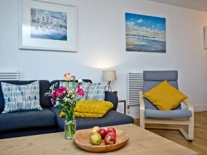 Lounge with sofa, coffee table, arm chair in open plan living - 5 At The Beach