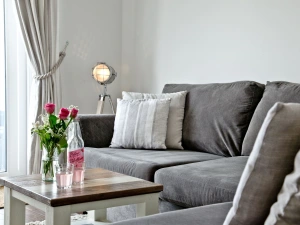 Living area with sofa, coffee table  - Sunnymead