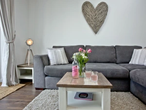 Large sofa in lounge, TV, lamp - Sunnymead