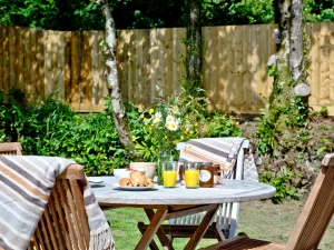 Outside dining area in the enclosed garden - The Secret Roundhouse