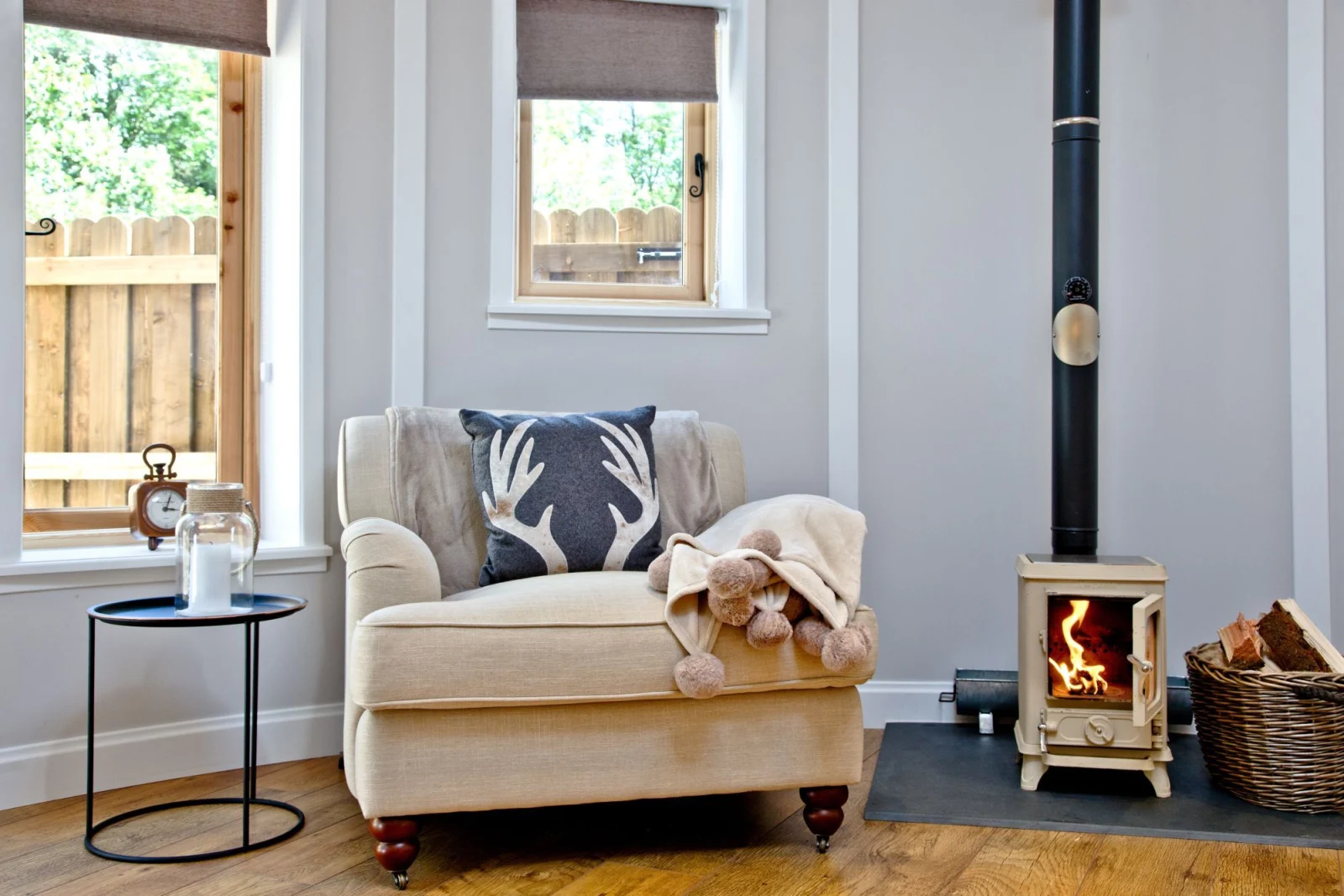 Comfortable chair with cosy fireplace - The Secret Roundhouse