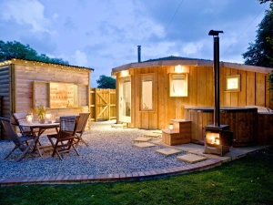 The Secret Roundhouse lit up at night - The Secret Roundhouse