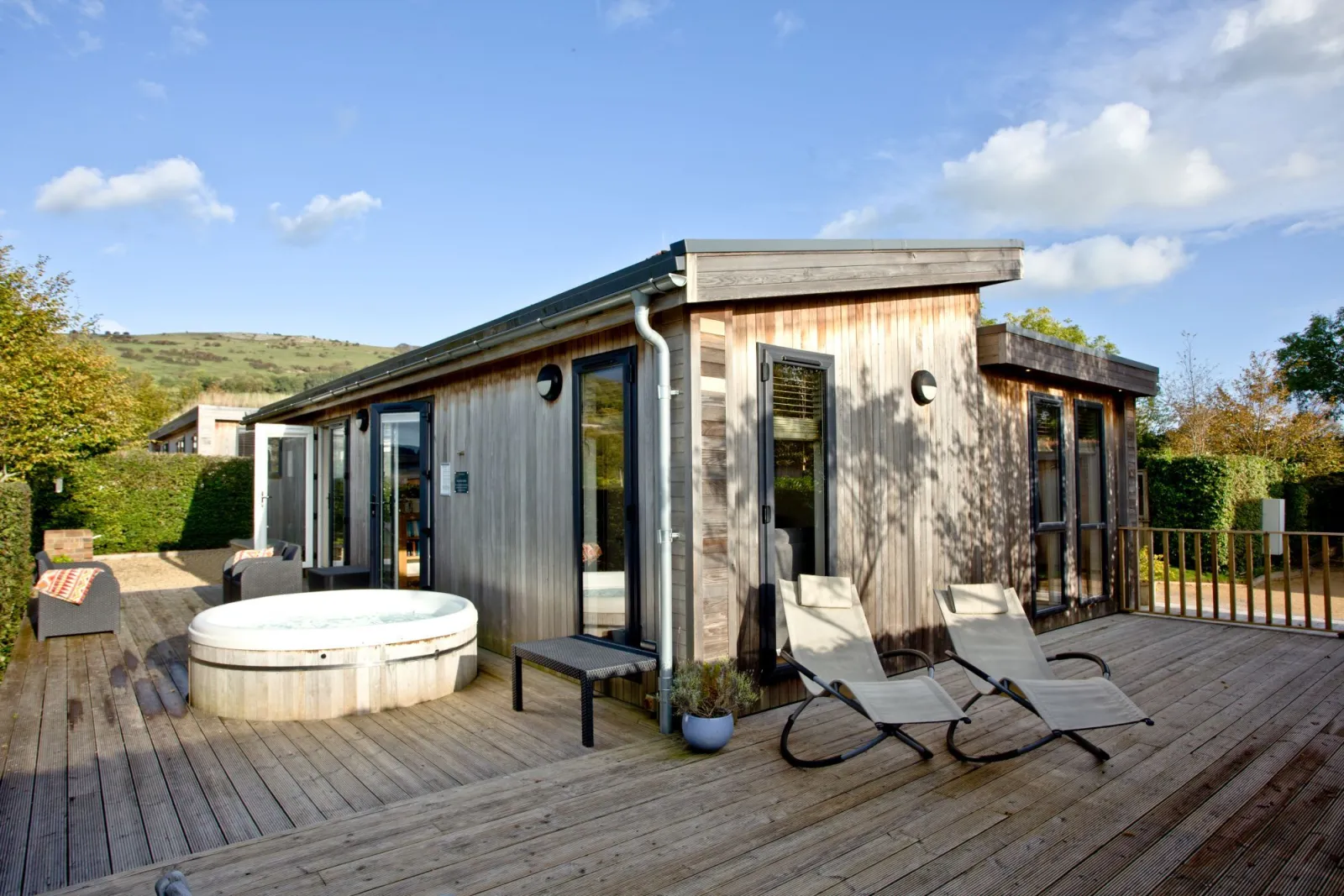 Decked area with hot tub and sun loungers - Diamond Lodge, Strawberryfield Park