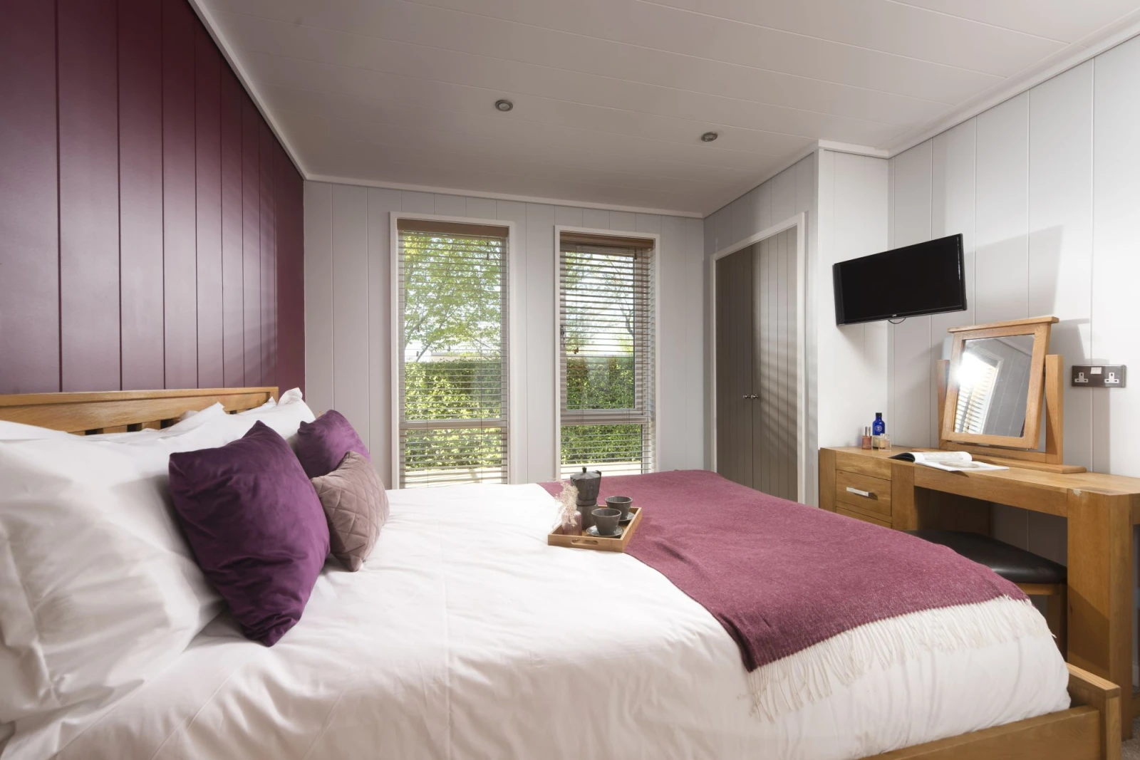 King size bed in master bedroom with TV - Diamond Lodge, Strawberryfield Park