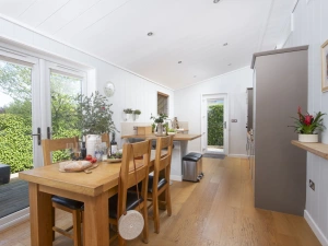 Dining table seating four with access to decking - Diamond Lodge, Strawberryfield Park
