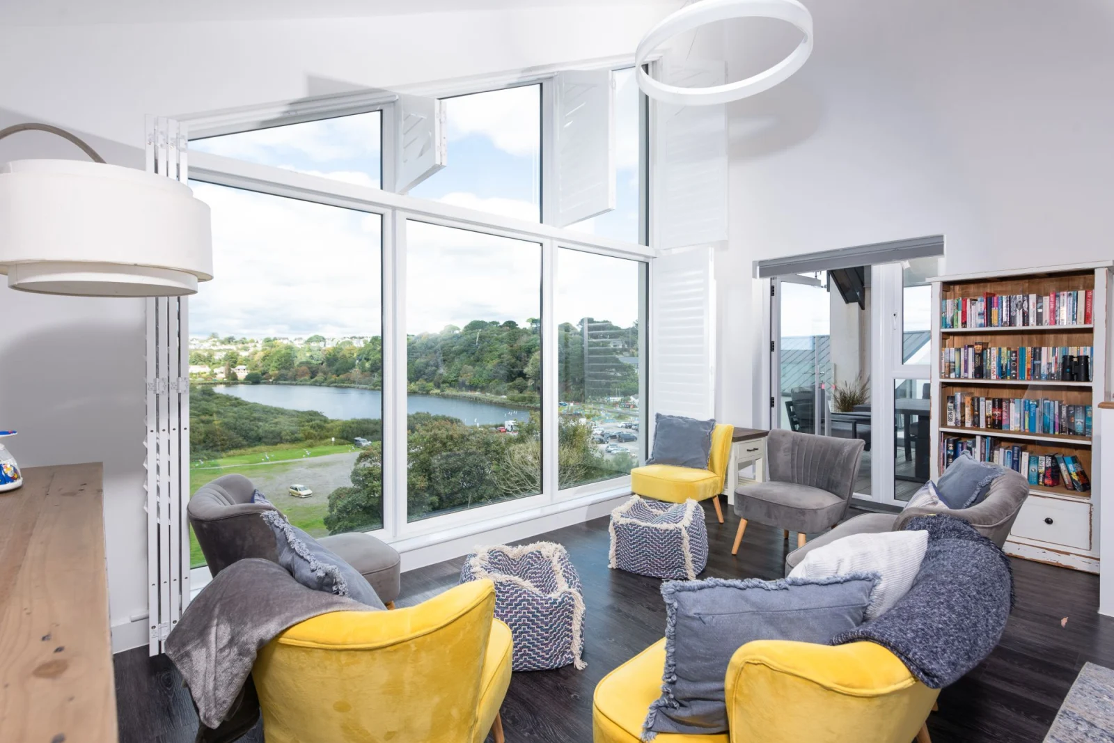 Seaview property, relaxing living space with bookcase - Swanpool View