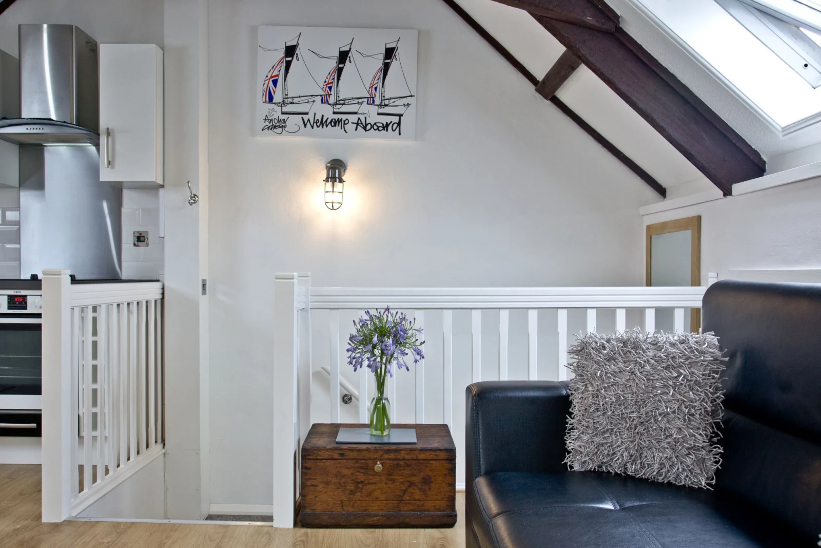 The sofa bed with seating for all guests - Anchor Cottage 