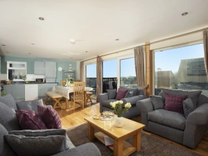 Open plan living area, sofa's, dining table and countryside view - Lodge 40, Retallack