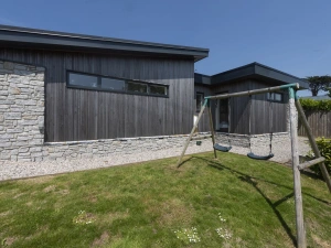 Swing set in the garden - 6 The Dunes, Upton Towans