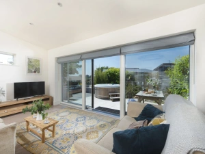 Sliding patio doors leading into the property, Smart TV with sofa seating for 4 guests - 6 The Dunes, Upton Towans