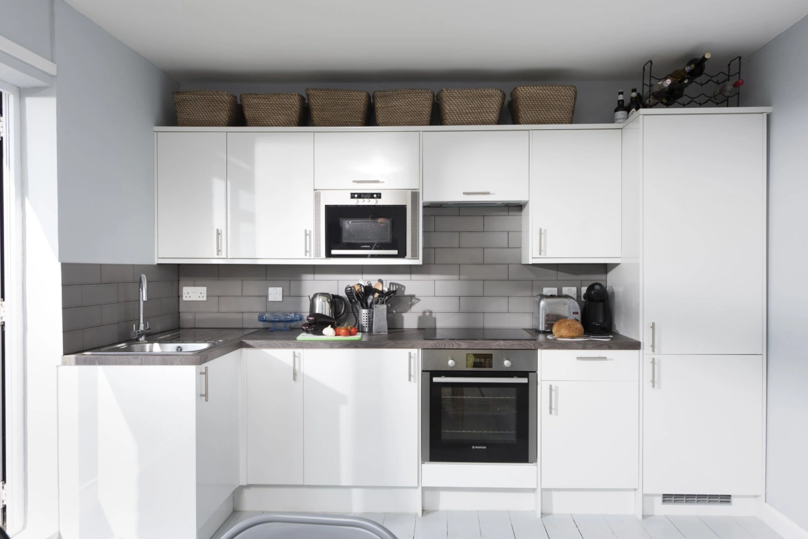 Kitchen with fridge, freezer, microwave, oven and hob - Mousehole View