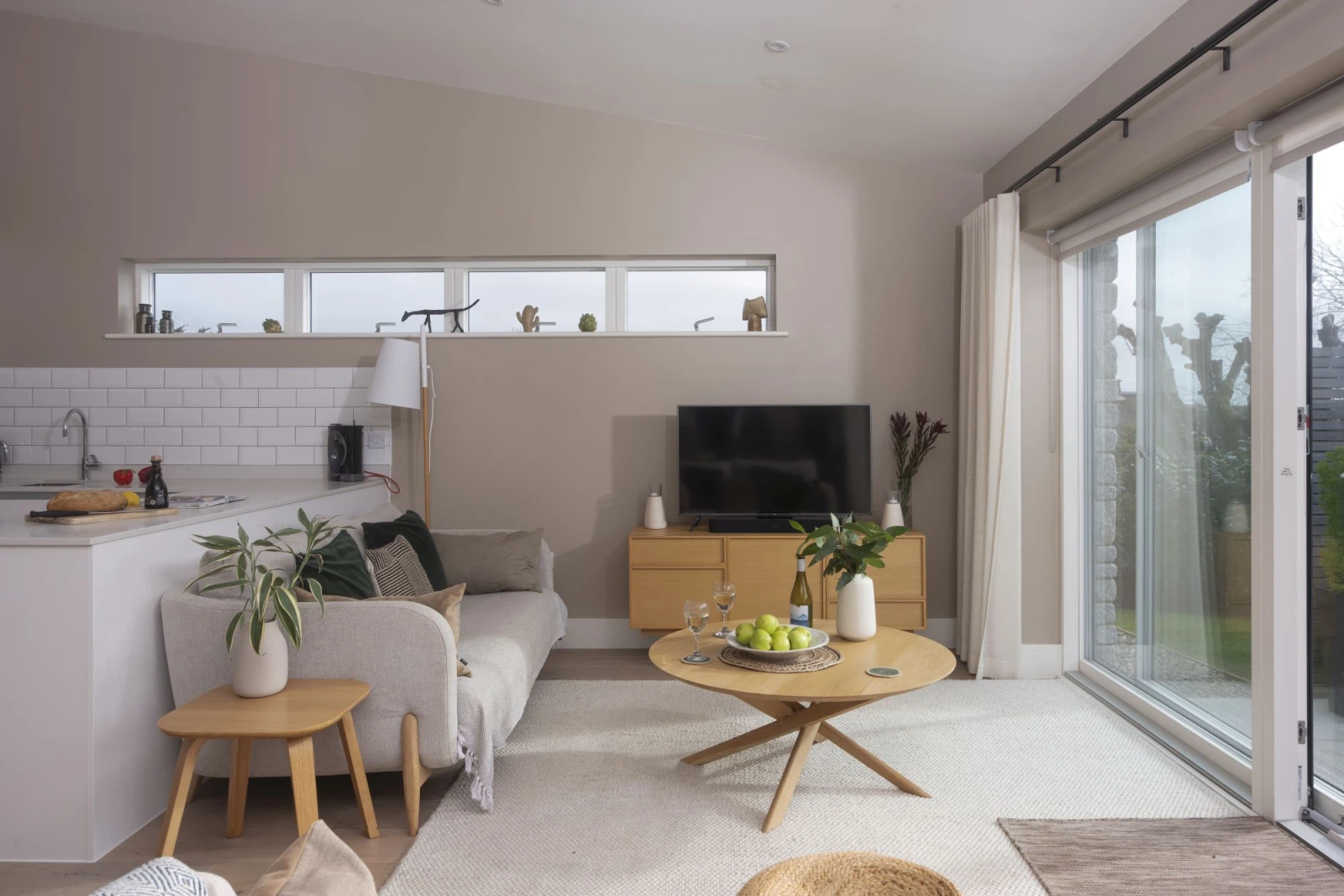 Living area with smart TV and coffee tables leading onto the kitchen - Salt Life, Dunes at Upton Towans