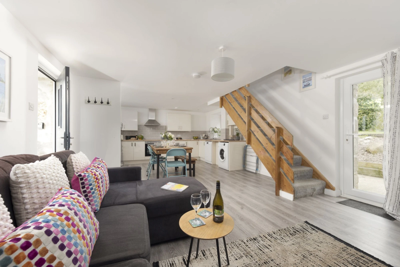 Living space leading into the dining and kitchen areas - Aval Dor Barn