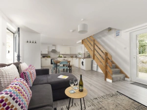 Living space leading into the dining and kitchen areas - Aval Dor Barn