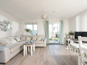 Lounge with large sofa, TV and access to garden - Wish You Were Here 