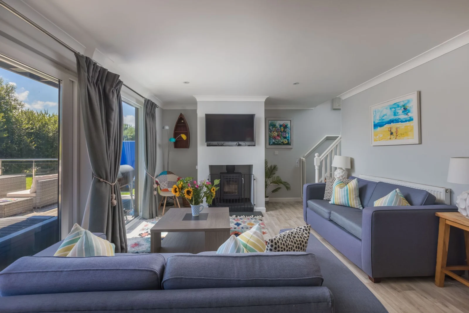 The living area with a TV for entertainment - Lodge 27