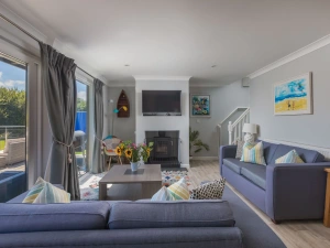 The living area with a TV for entertainment - Lodge 27