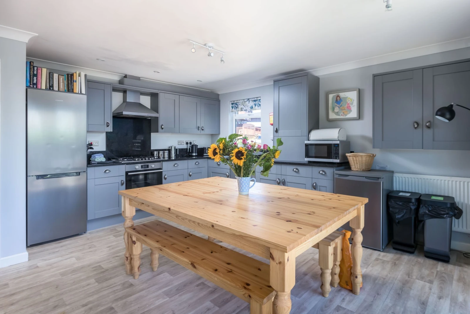 The kitchen with a dining table, fridge/freezer and oven - Lodge 27