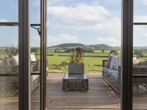View to the garden from the decking - Decoy Farm House