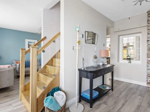 Snug room next to the living room, stairs leading up to the bedrooms - Bumble Cottage