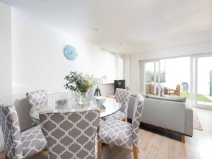 Dining area seating six with access to living are and garden - Kingsley House