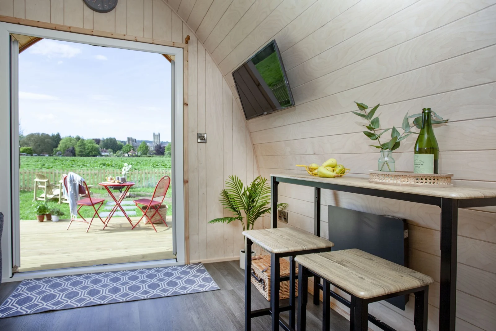 Stools inside with a table to sit and enjoy the view - Chapterhouse