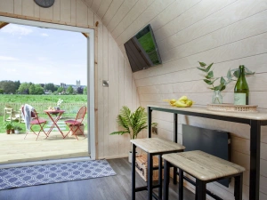 Stools inside with a table to sit and enjoy the view - Chapterhouse