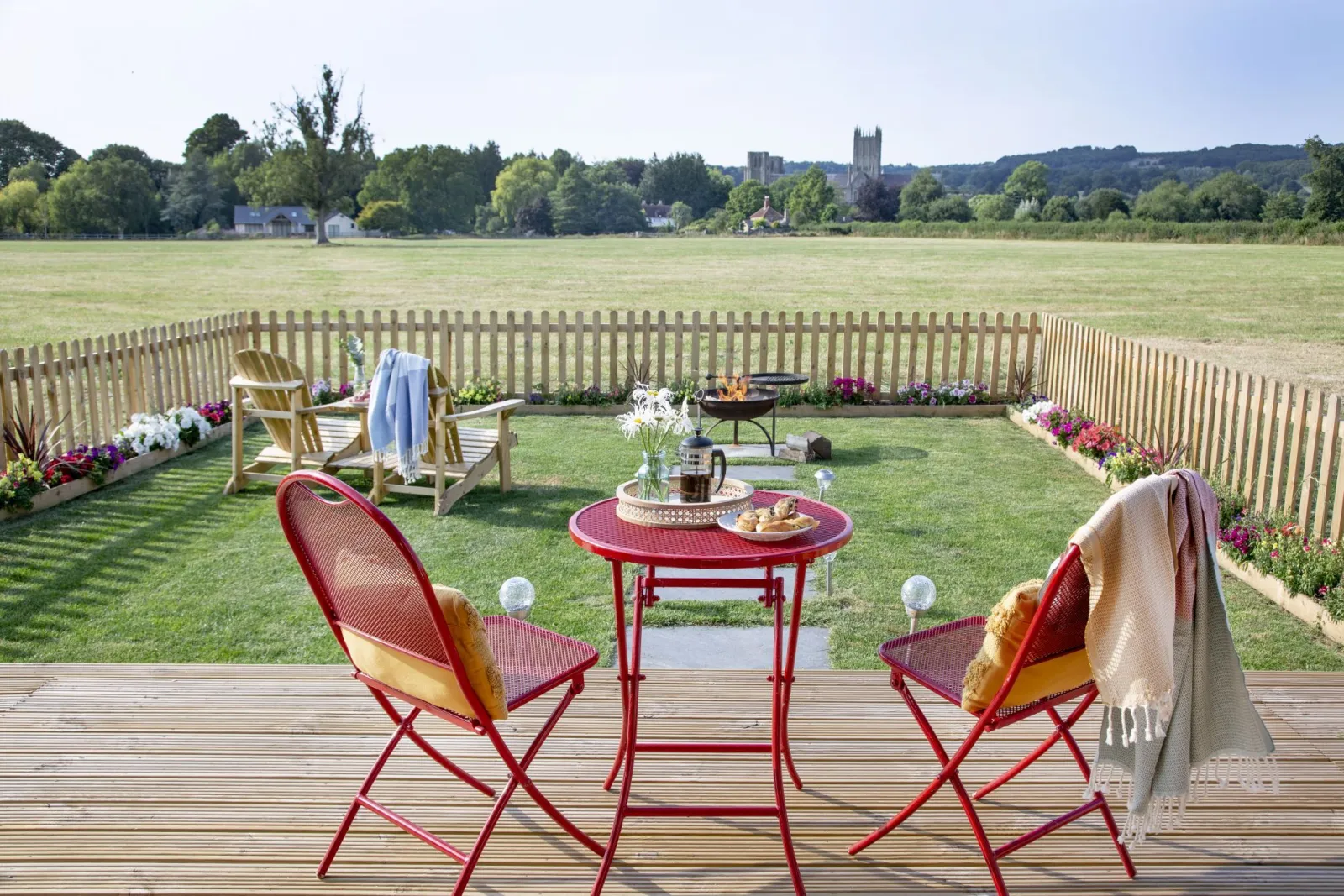 Outside dining table and chairs on the decking - Chapterhouse