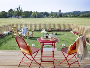 Outside dining table and chairs on the decking - Chapterhouse