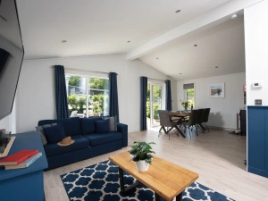 The living area with sofas and a coffee table - Buttercup Lodge 