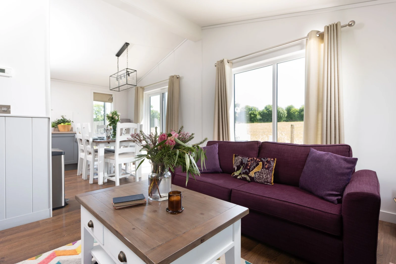 Comfortable sofa in the living area - Forget Me Not Lodge 