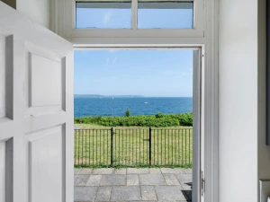Sea views from the kitchen, leading onto enclosed courtyard and grass area - 1 The Old Signal House, Penlee Point