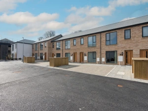 Front of the property with parking access - Towans Retreat