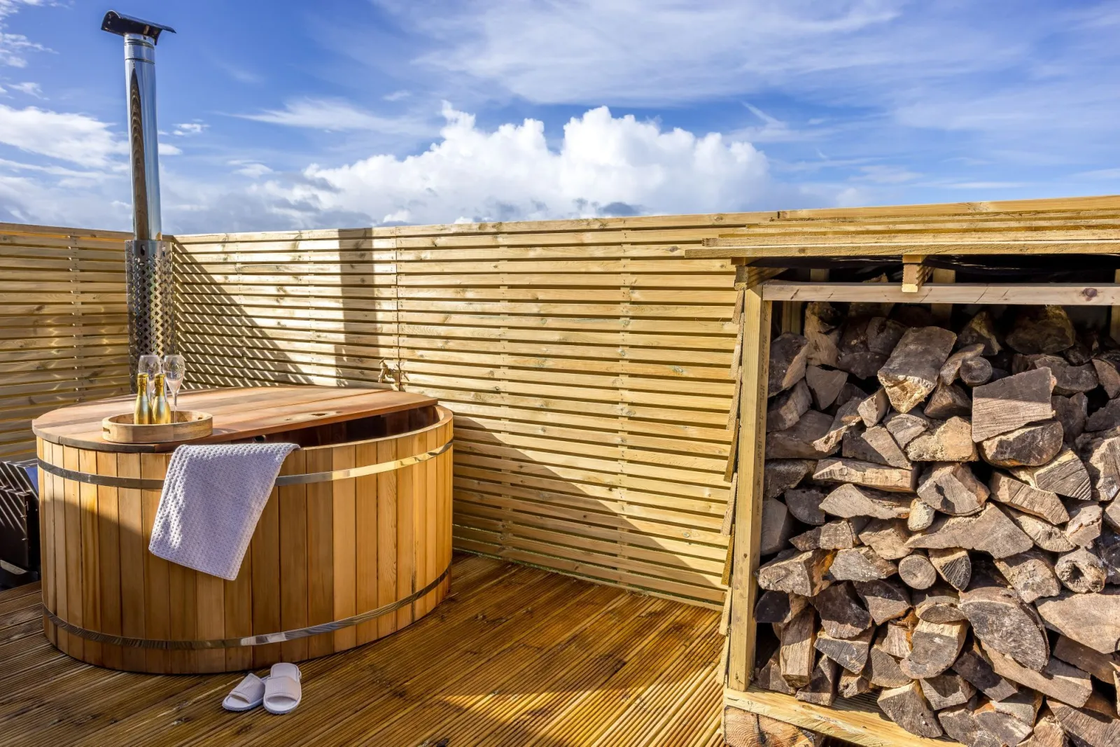 Wood fired hot tub and log store - The West Front, Cathedral View