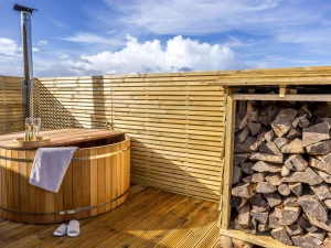 Wood fired hot tub and log store - The West Front, Cathedral View