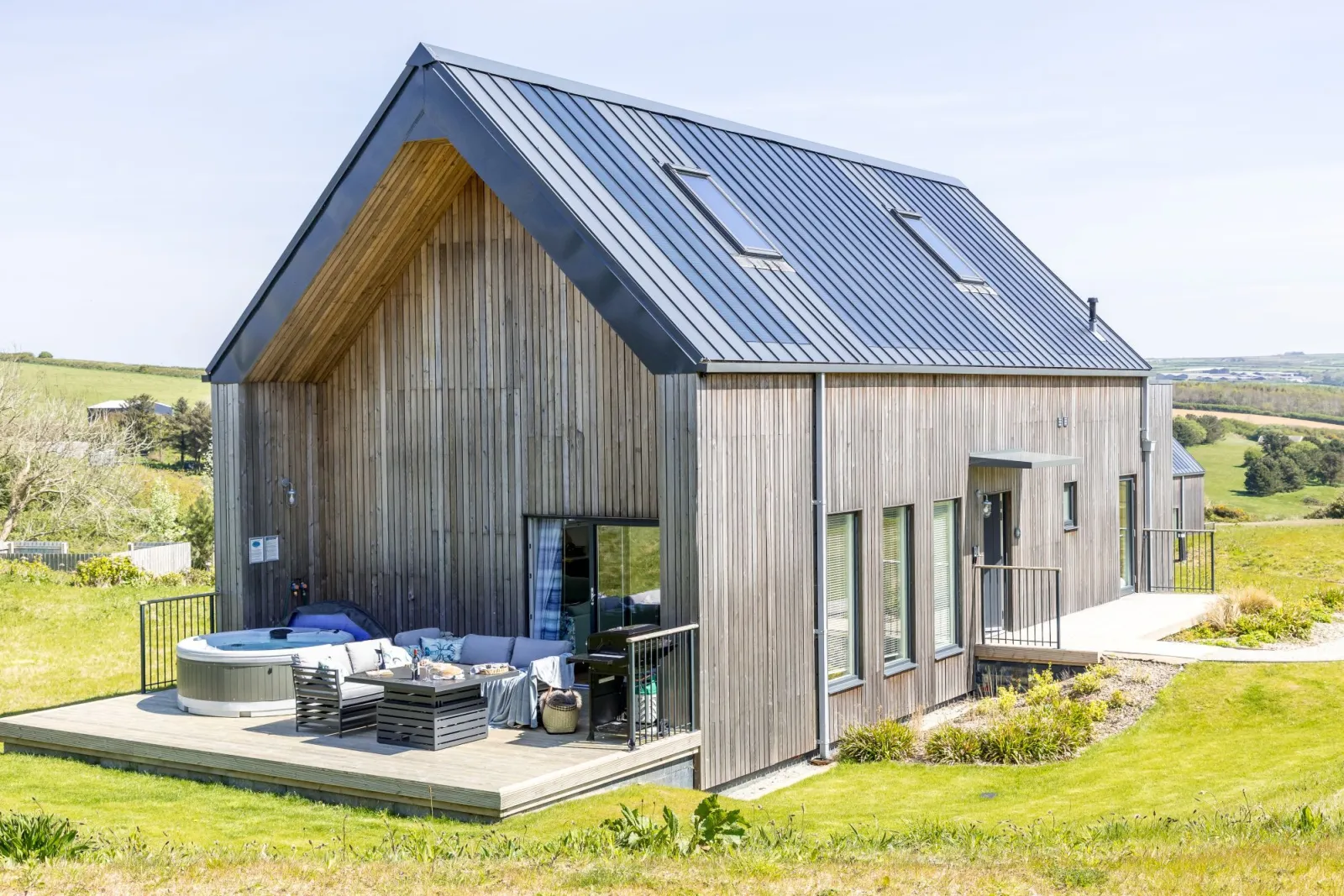 Property building with private decking terrace with hot tub and seating area - 9 The Vista, Willingcott