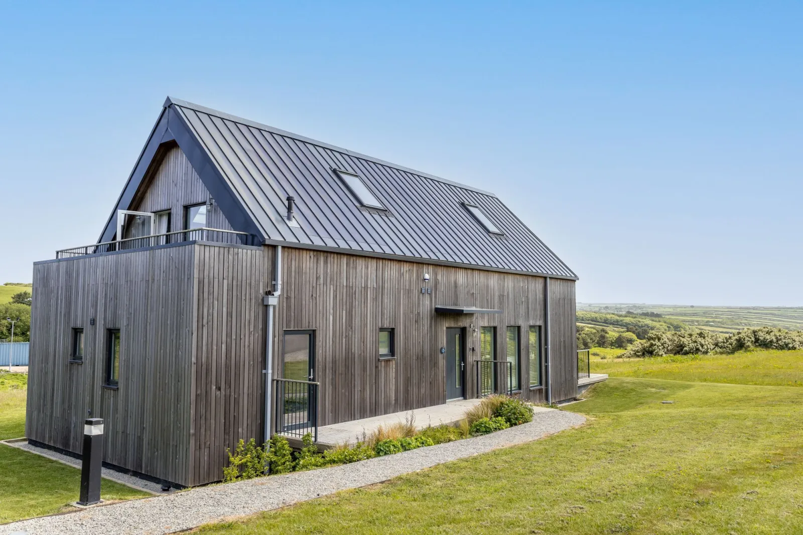 Property building with path to parking area - 2 The Vista, Willingcott