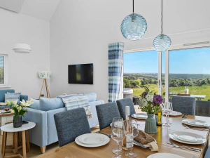 Dining area and living area leading onto the decked patio - 2 The Vista, Willingcott