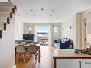 Open plan kitchen, dining and living space with first floor access - 4 Out Of The Blue