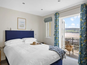 Master bedroom with balcony access- 4 Out Of The Blue