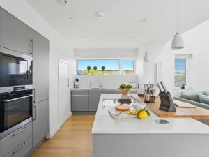 Lovely open kitchen with island and valley views from the window -  1 The Vista, Willingcott