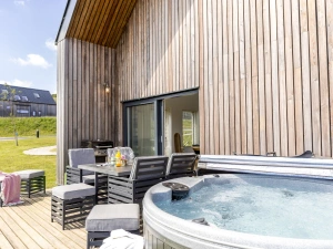Decked patio with electric hot tub and table seating for eight -  1 The Vista, Willingcott