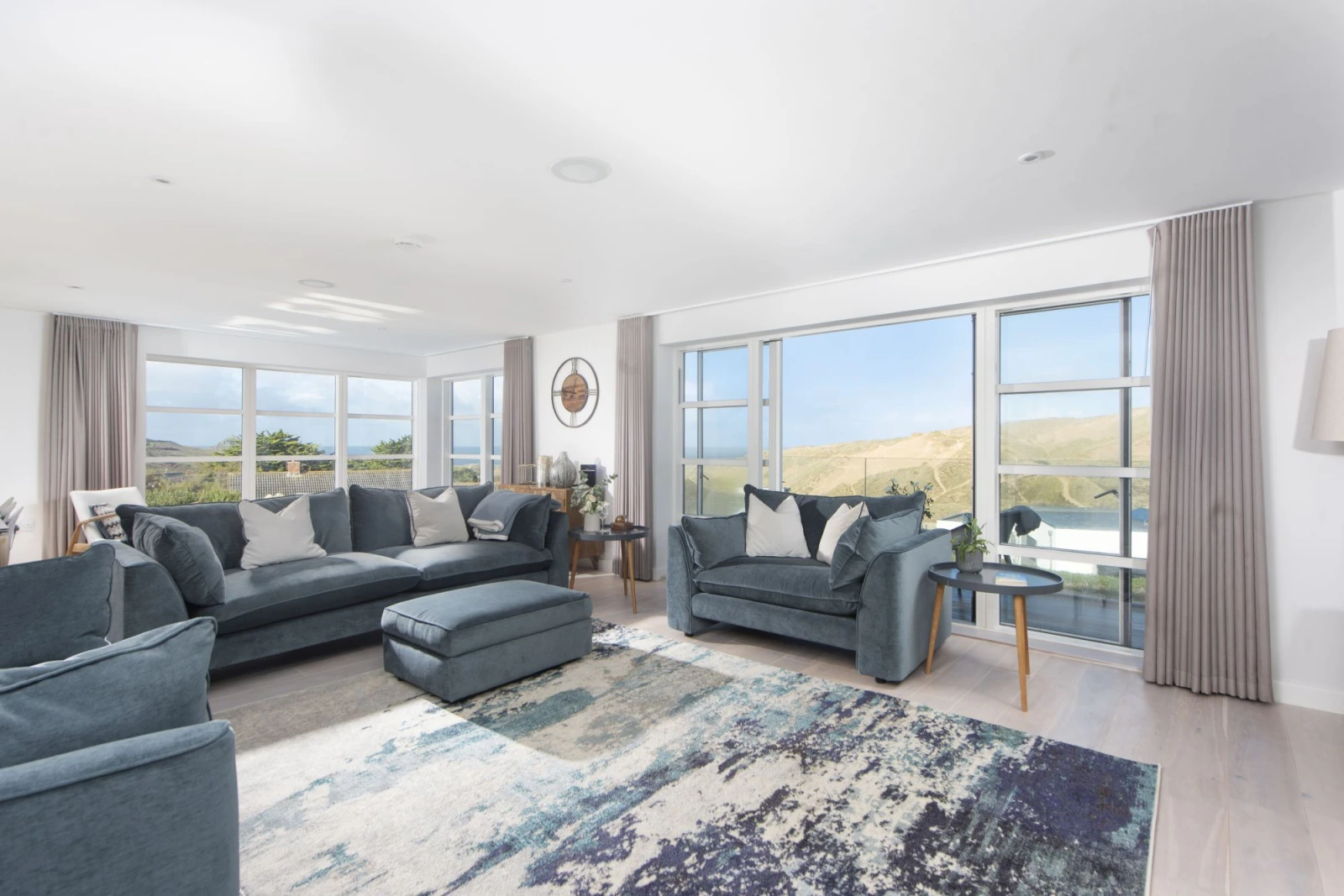 Living room with views over the sand dunes to the sea beyond - Sandyford