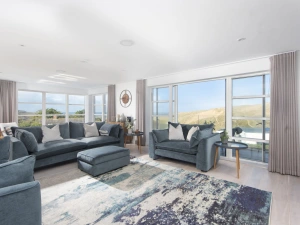 Living room with views over the sand dunes to the sea beyond - Sandyford